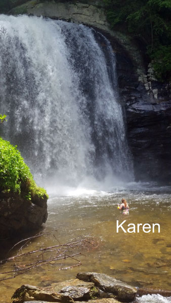 Karen Duquette in the water at Looking Glass Falls